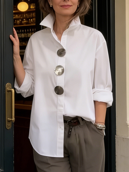 Elegant cotton and linen blouse with a stand-up collar and metal buttons