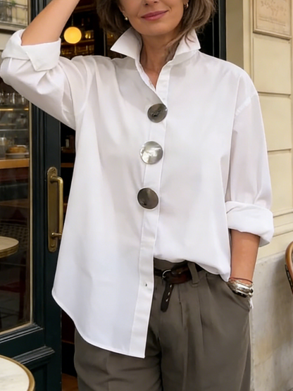 Elegant cotton and linen blouse with a stand-up collar and metal buttons