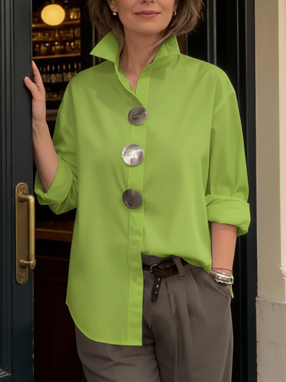 Elegant cotton and linen blouse with a stand-up collar and metal buttons