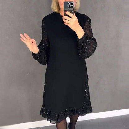 Women's dresses with a round neckline and crystals in a solid color
