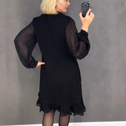 Women's dresses with a round neckline and crystals in a solid color